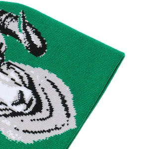 Detail shot of green knitted beanie featuring a high-quality animal jacquard tiger pattern
