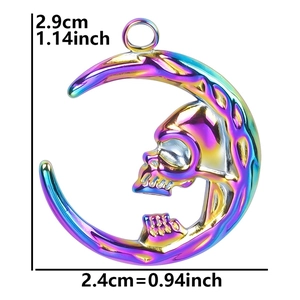 Iridescent moon and skull pendant showing dimensions of 2.9cm in height and 2.4cm in width