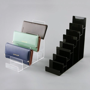 Clear and black acrylic multi-tier wallet display stands for retail shelf organization