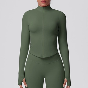 Detail view of olive green zip-up yoga jacket with thumbholes and high-waist leggings