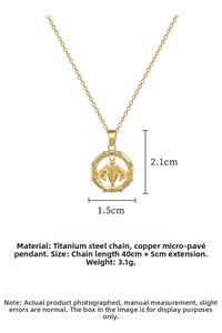 Detail of gold bee pendant necklace showing 40+5cm titanium steel chain dimensions
