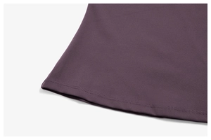 Detail of the high-quality double-needle hem stitching on brushed purple yoga fabric