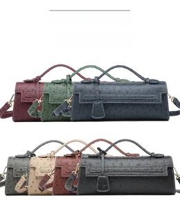 Detailed multi-color ostrich leather texture handbags with metal buckles and handles