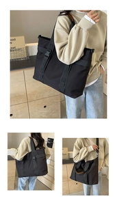 Three-way view of a black canvas tote bag with adjustable straps and buckle detail