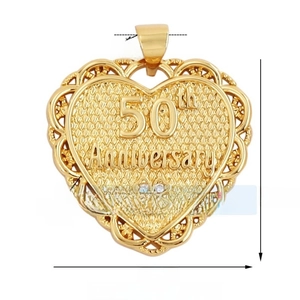 Macro shot of 50th Anniversary gold heart pendant with hollow patterns and dimensions