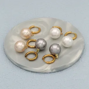 Three-pair set of elegant round pearl drop earrings in champagne, white, and gray colors