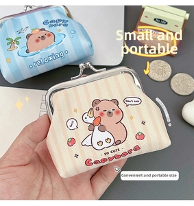 Close-up of retro metal clasp and cute capybara patterns on PU leather coin purses