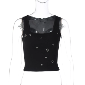 Detail of black ribbed knit crop top featuring silver metal grommet eyelets decoration