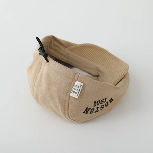 Close-up of beige suede beret showing adjustable strap and BOSTON 1920 embroidery