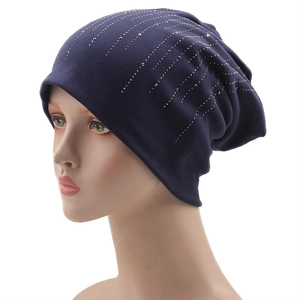 Navy blue cotton beanie for women with sparkling silver rhinestones in a sunburst pattern