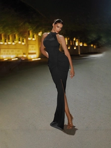Sexy black halter neck ruched maxi dress with high side slit for women in evening street style