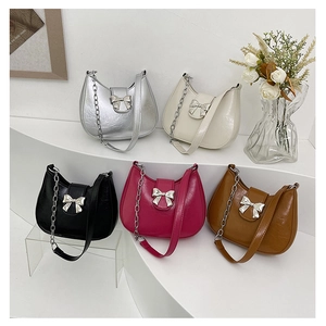 Women PU Leather Shoulder Bag With Metal Bowknot Semi Circular Underarm Bag Fashionable Hobo Bag Versatile Design