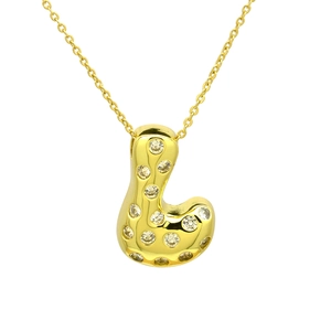 Detail view of a gold-plated puffer letter L pendant with sparkling zircon insets