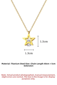 Detailed view of gold star pendant necklace in titanium steel with zircon stone inlay