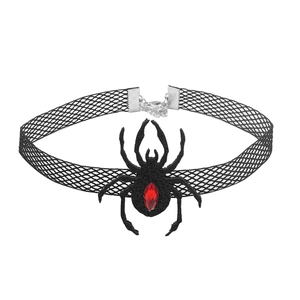 Detail of gothic spider choker featuring black mesh and a red gemstone pendant