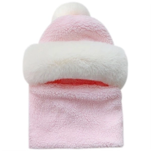 Detailed close-up of pink and white plush integrated winter hat with fuzzy pom-pom