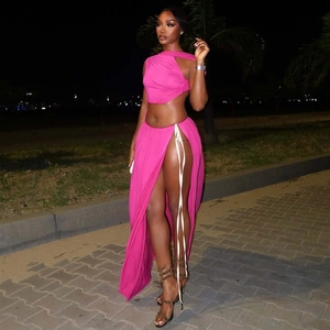 Detailed view of the rose red crop top with high slit skirt and side drawstring ties