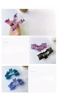 Detail showing colorful acetic acid cloud hair claws with marble and wave patterns