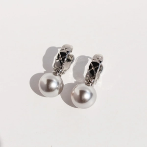 Elegant silver U-shaped hoop earrings with quilted pattern and white pearls for women