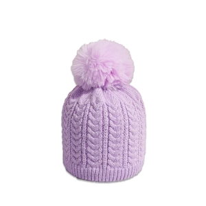 Detail view of the cable knit texture and faux fur pom-pom on this purple winter beanie