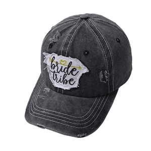Distressed dark grey baseball cap with Bride Tribe embroidery and retro worn detail