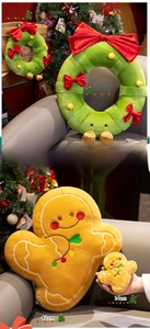 Detail view of plush Christmas wreath and gingerbread man doll for festive decoration