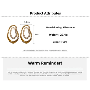 Detailed view of gold-plated irregular oval earrings with rhinestone size specs