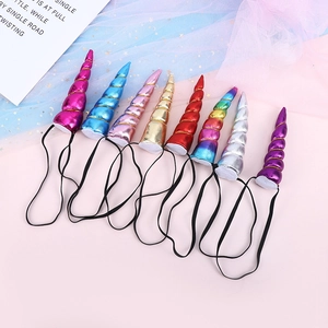 Set of eight colorful glitter unicorn horn headbands with elastic bands for party wear