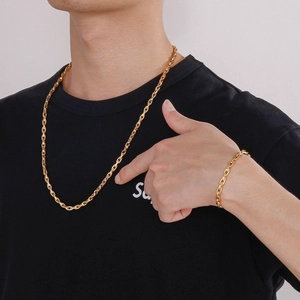 Minimalist gold stainless steel 5mm oval link chain necklace and bracelet set on model
