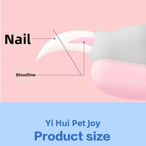 Close-up of pink pet nail clippers showing precise cutting edge and safety guard mechanism
