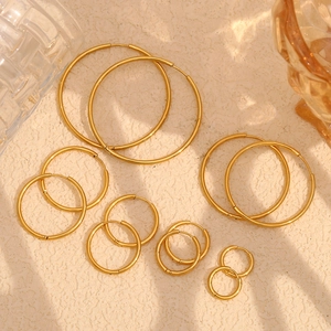 Detailed set of 18K gold plated stainless steel hoop earrings in seven various sizes