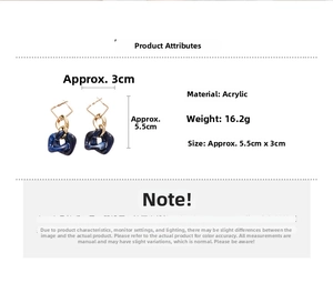 Detail showing blue marble acrylic geometric earrings with size and weight measurements