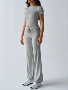 Detailed view of gray casual two-piece set featuring short sleeve t-shirt and drawstring pants