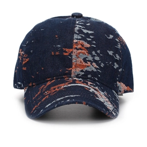Vintage jacquard baseball cap with blue, orange, and white paint splatter pattern