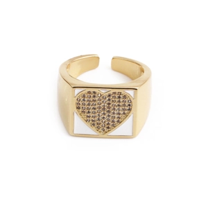 Close-up of gold-plated heart ring featuring brown zircon and white enamel detail