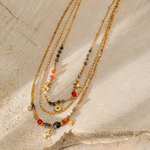 Three-layer gold titanium steel necklace with colorful beads and sun star pendants
