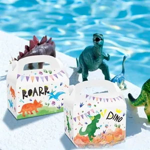 Macro view of dinosaur theme paper gift boxes with cartoon illustrations and handles
