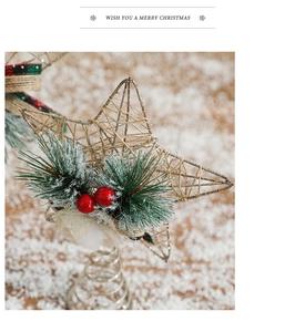 Close-up of a rustic glitter star Christmas tree topper with pine needles and red berries