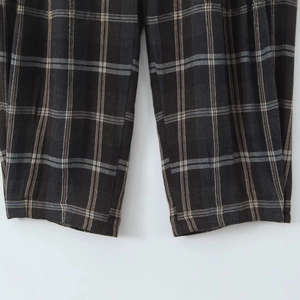 Deep grey plaid wide leg trousers in breathable fabric with classic checkered pattern