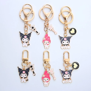 Detailed view of metal keychains with enamel Kuromi and My Melody character charms
