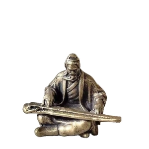 Miniature antique en laiton d'un sage jouant de la cithare avec finition bronze vieilli