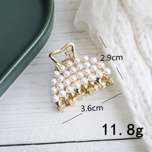 Detail view of pearl hair claw clip showing precise dimensions 3.6cm by 2.9cm and weight