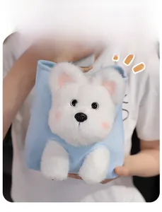 Close-up of soft white plush puppy bag with smooth fabric and fuzzy texture details