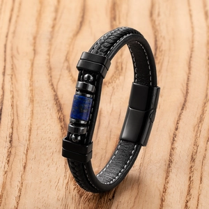 Detail of woven leather bracelet featuring blue lapis stone and magnetic clasp