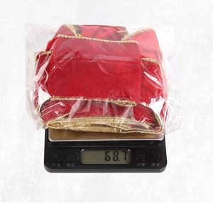 60cm large red velvet Christmas bow weighing 68.7g on an electronic scale for DIY decor