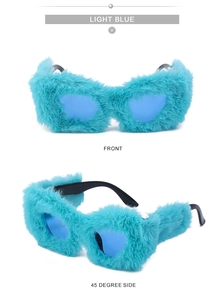 Detailed views of light blue plush heart-shaped sunglasses with faux fur texture