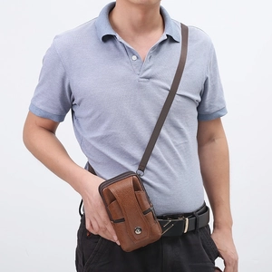 Brown leather belt pouch for men featuring flip magnetic buckle and zipper compartment