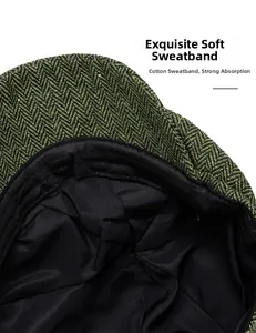 Macro detail of breathable cotton sweatband and lining inside the herringbone tweed flat cap