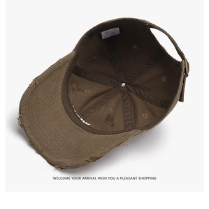 Détails de la doublure 100% coton et boucle métallique sur casquette vintage délavée