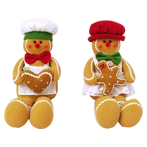 Detail of gingerbread plush elf set featuring chef hats and soft fleece textures
